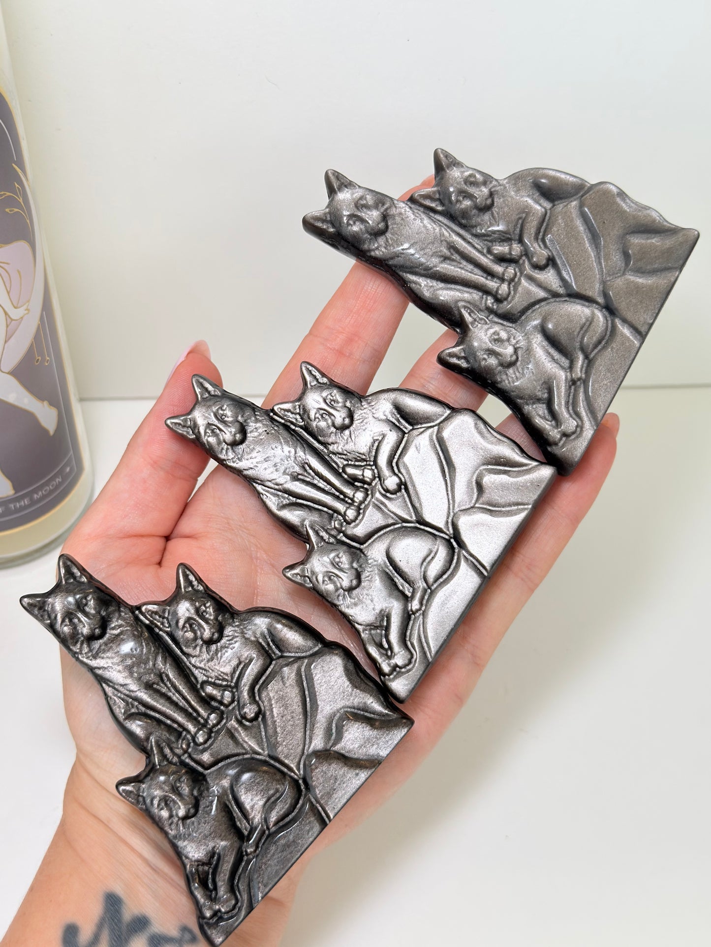 Silver Sheen Obsidian Wolves Carving