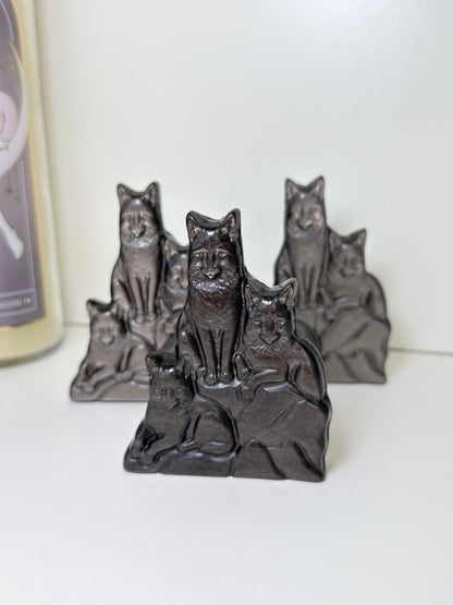 Silver Sheen Obsidian Wolves Carving