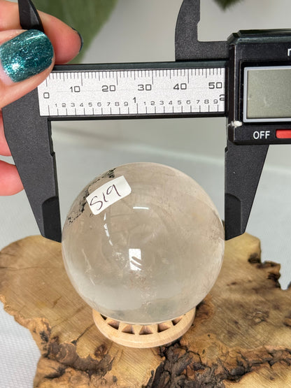 Clear Quartz Sphere With Hematite Inclusions