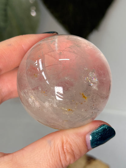 Clear Quartz Sphere With Hematite Inclusions