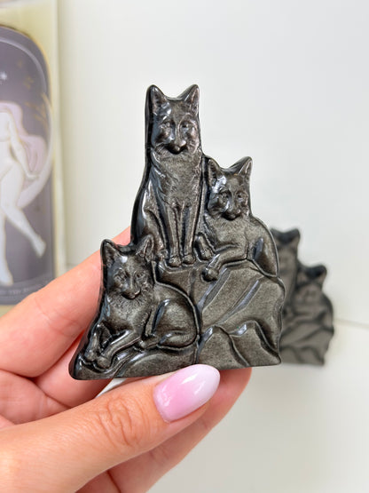 Silver Sheen Obsidian Wolves Carving