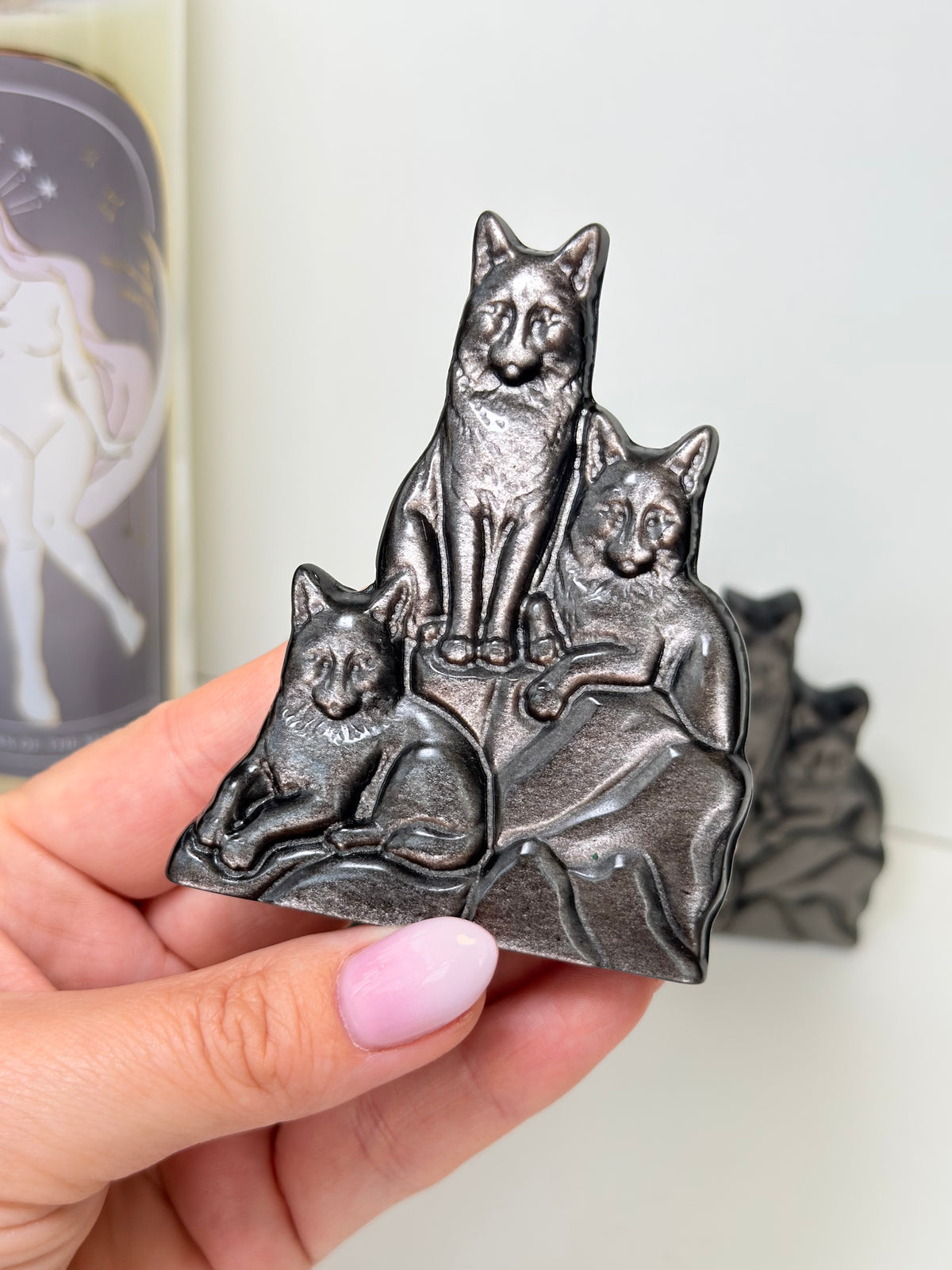 Silver Sheen Obsidian Wolves Carving