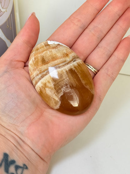 Banded Honey Calcite Palm Stone