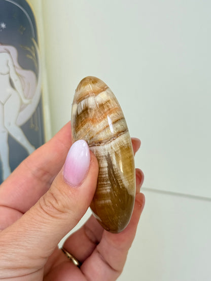 Banded Honey Calcite Palm Stone