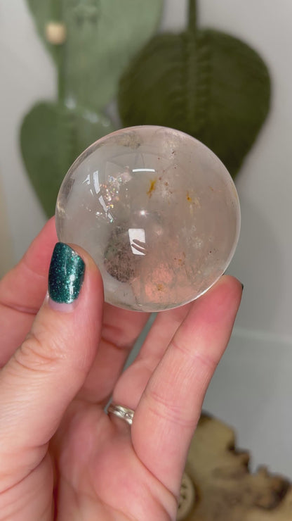 Clear Quartz Sphere With Hematite Inclusions